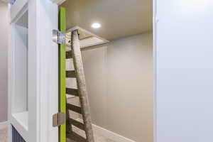 Bathroom featuring recessed lighting and carpet