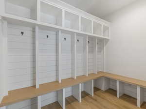 Mudroom featuring light wood-style flooring