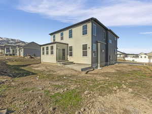 Rear view of house with a residential view