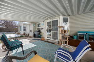 View of patio featuring area for grilling