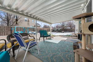 Fenced backyard featuring a patio and outdoor furniture