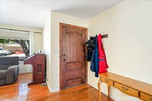 Entryway with wood-type flooring