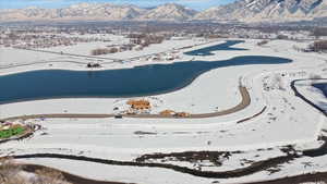 Snowy aerial view featuring a mountain view