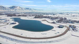 Snowy aerial view featuring a mountain view