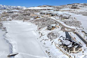 Snowy aerial view with a mountain view