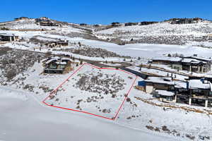 Aerial overview of property's location featuring property parcel outlined