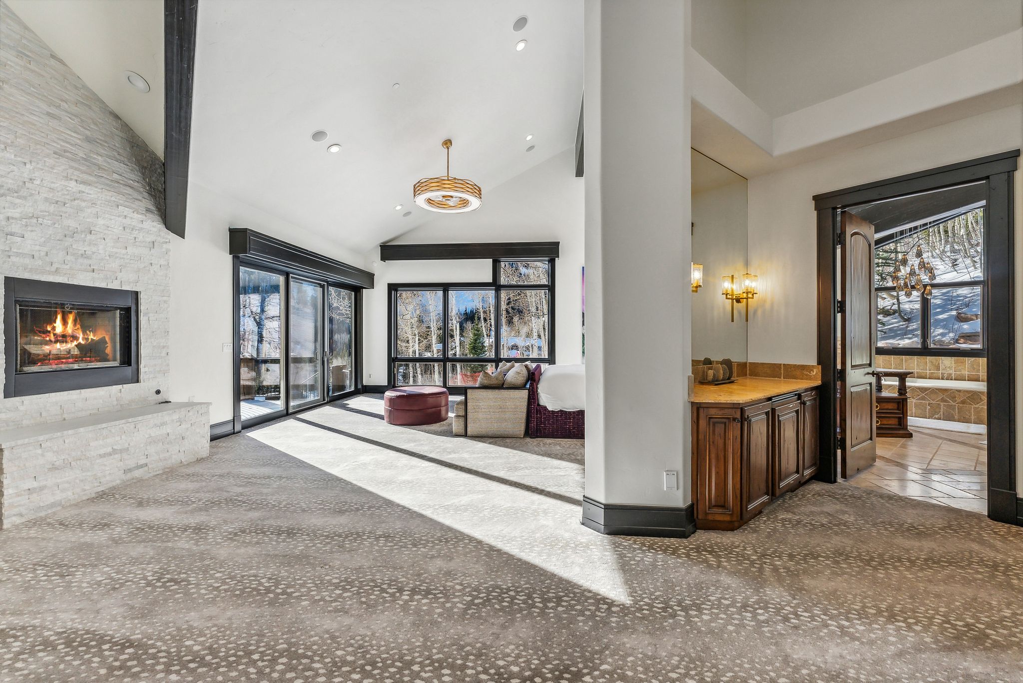 Common area featuring vaulted ceiling and recessed lighting