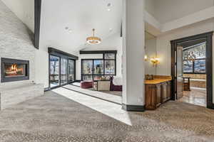 Common area featuring vaulted ceiling and recessed lighting