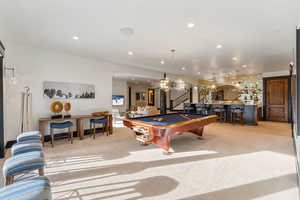 Playroom with a community bar, billiards, and recessed lighting