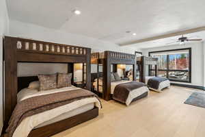 Bedroom with recessed lighting, wood finished floors, and a ceiling fan
