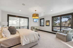 Bedroom with recessed lighting and carpet