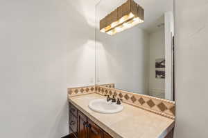 Bathroom with vanity and toilet