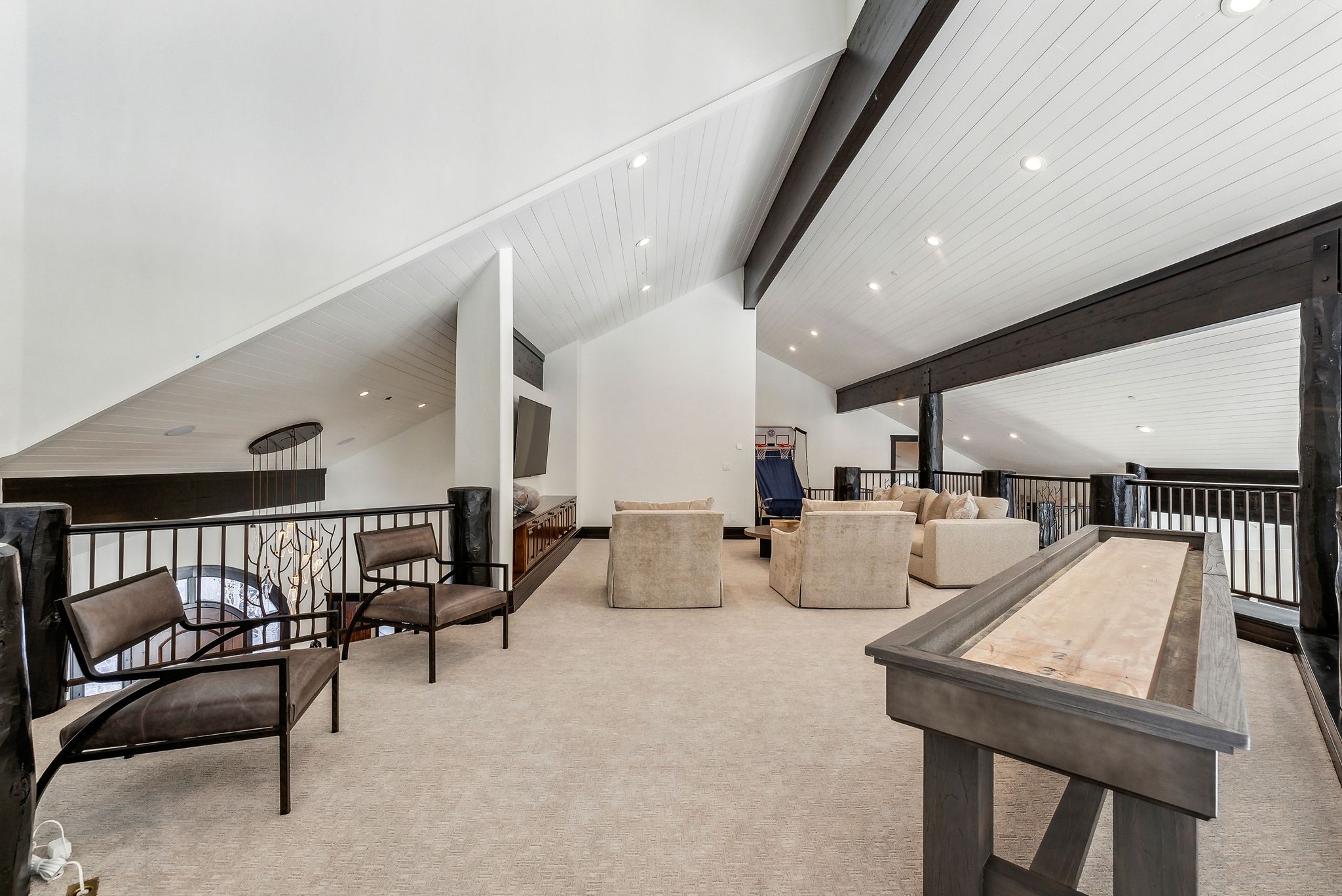 Playroom with carpet, recessed lighting, and lofted ceiling