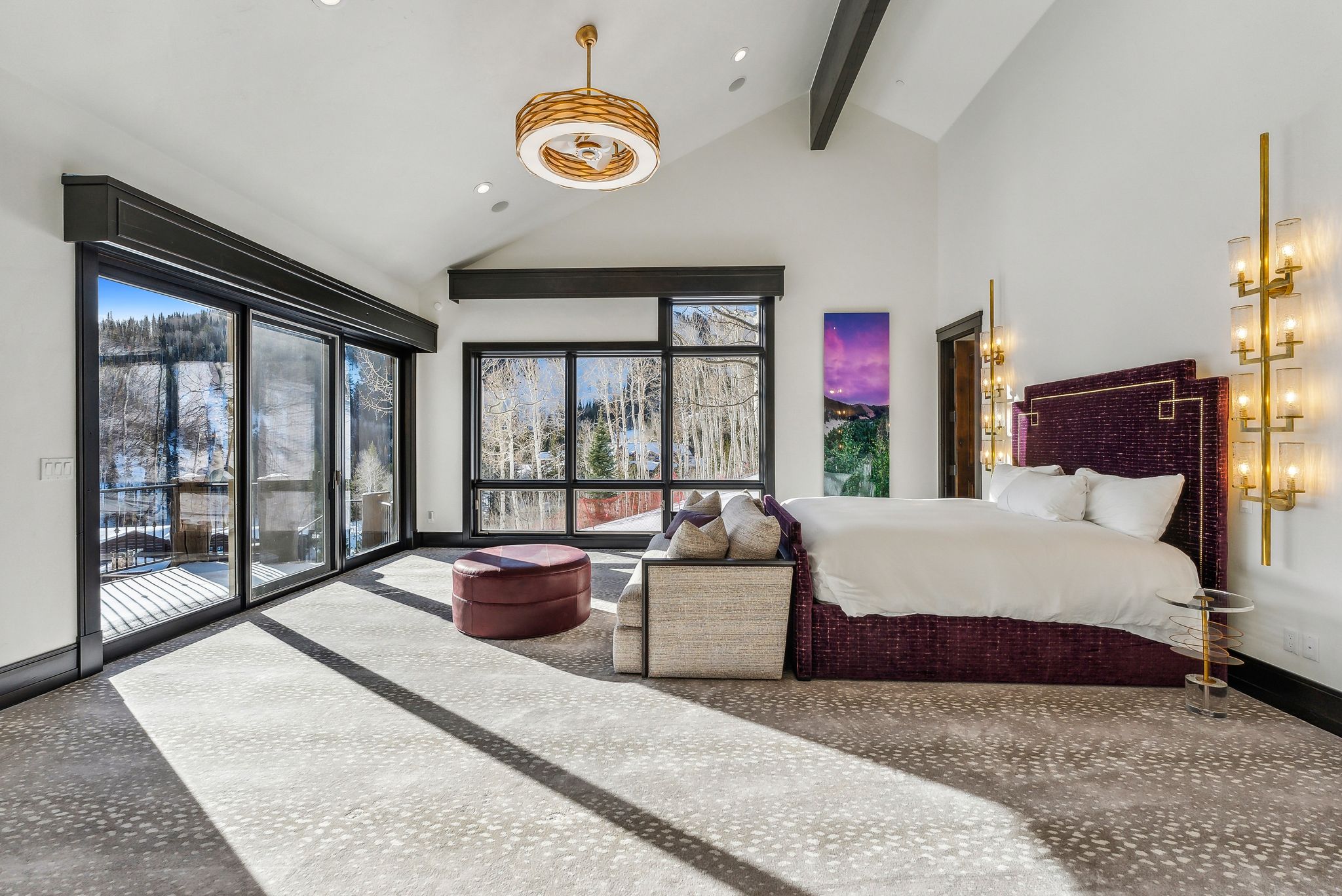Bedroom with lofted ceiling, access to exterior, and recessed lighting