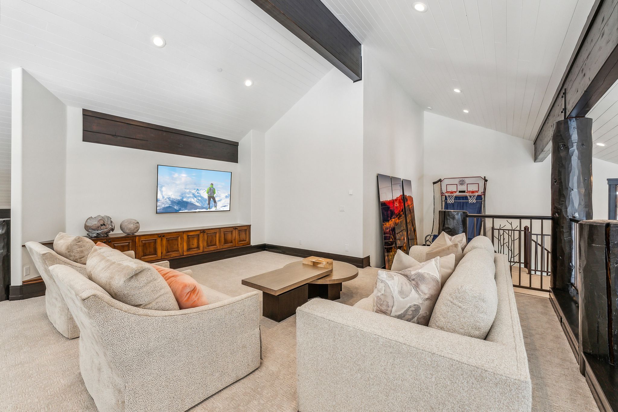 Living room with light carpet and recessed lighting