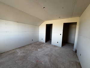 Bonus room featuring vaulted ceiling