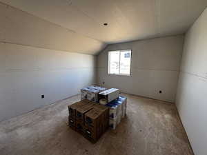 Bonus room featuring vaulted ceiling