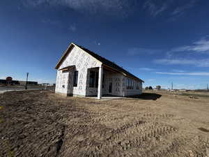 View of front of home featuring a patio