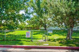 View of home's community featuring a gate