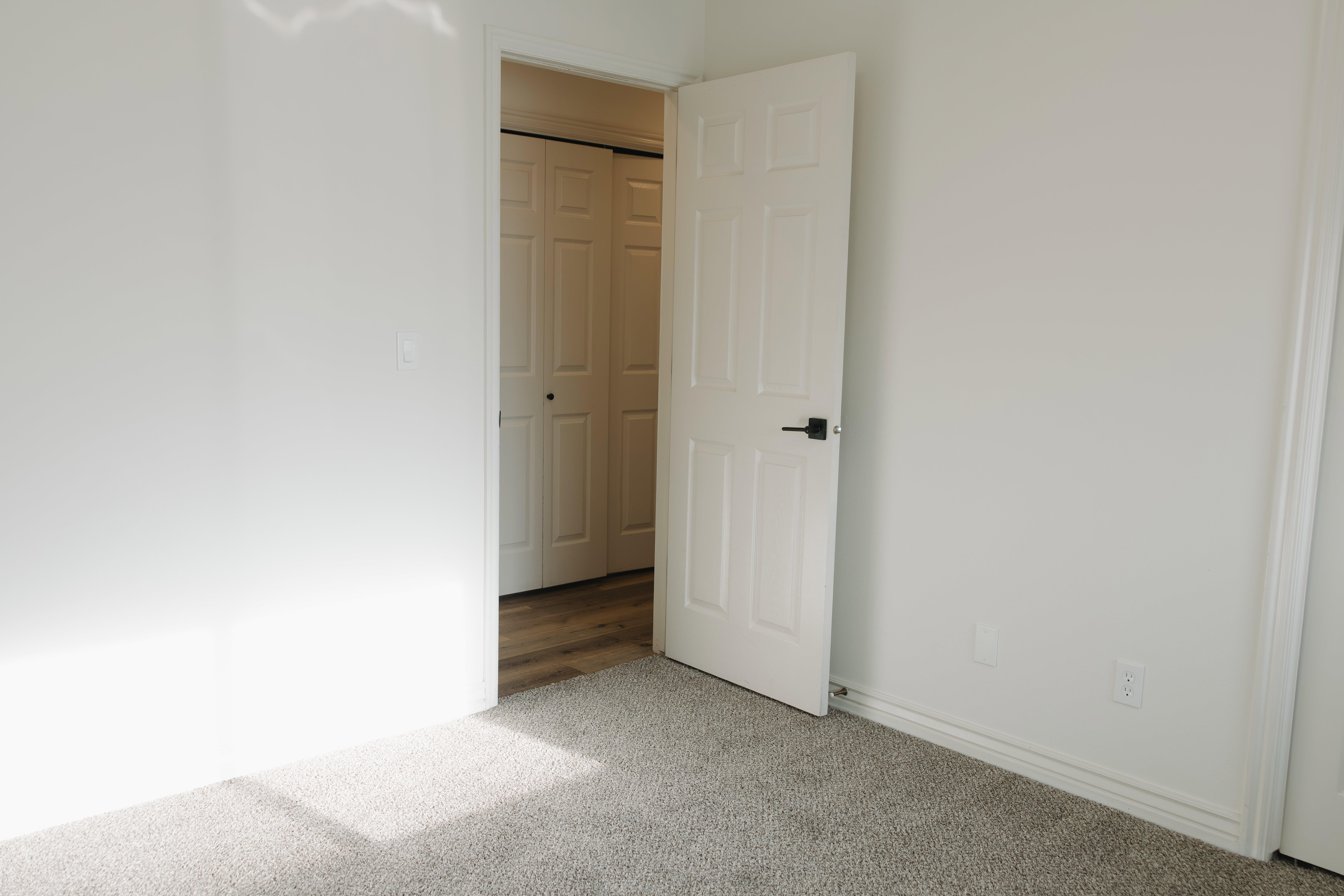 Unfurnished bedroom featuring carpet floors