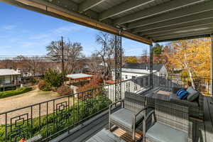 Balcony featuring an outdoor hangout area and a residential view