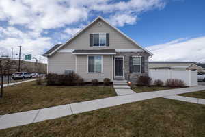 View of front of property featuring stone siding