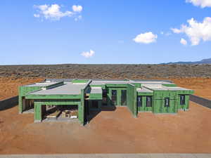 View of property's community featuring a mountain view and a patio