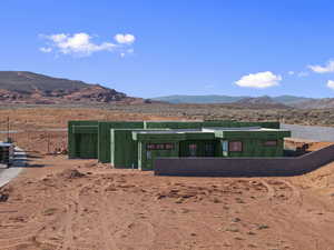View of front of property with a mountain view