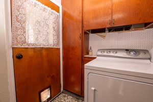 Laundry room featuring washer / dryer