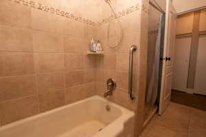 Bathroom with tile patterned flooring