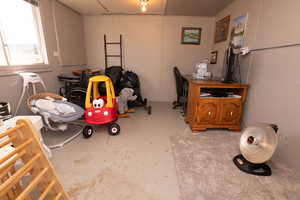 Rec room featuring concrete floors