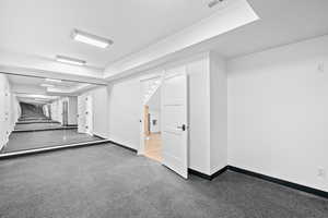 Finished below grade area with carpet and baseboards