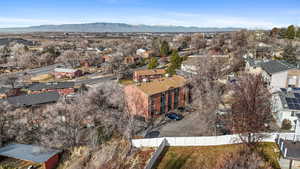 Aerial view of residential area with a mountain backdrop