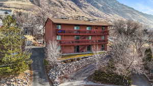 View of apartment building / complex featuring a mountain view