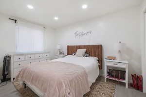 Bedroom featuring recessed lighting and light wood-style floors
