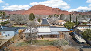 View of mountain background featuring nearby suburban area