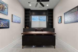 Office space with ceiling fan, light carpet, and recessed lighting
