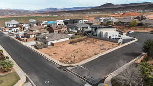 Aerial perspective of suburban area with mountains