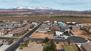 Aerial view of residential area with a mountain backdrop