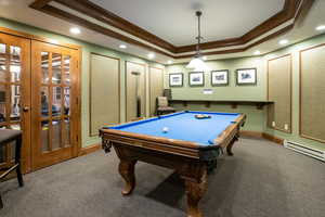 Playroom with crown molding, billiards table, a tray ceiling, french doors, and recessed lighting