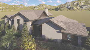 View of subject property with a mountain backdrop