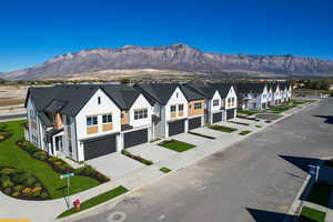 View of mountain backdrop with nearby suburban area