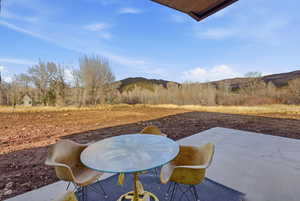 View of patio featuring a mountain view