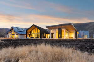 Back of property with a patio area