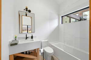 Full bath with vanity and shower / bathtub combination