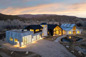 Modern architectural ensemble featuring multiple structures with complementary finishes