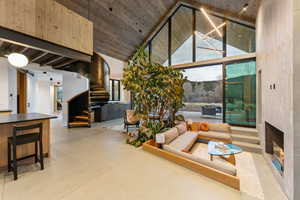 Vaulted wood-paneled ceiling with exposed beams