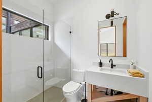 Full bathroom with a stall shower and vanity