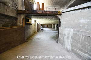 Misc room with unfinished concrete flooring