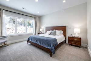 Bedroom featuring carpet flooring and recessed lighting